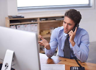 Image showing Business man, phone call and stress on landline in workplace, contact and consulting or networking. Male professional, frustrated and communication or discussion, technology and confusion for info