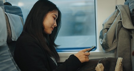 Image showing Japanese woman, travel and train on cellphone, social media and public transportation on metro bullet. Person, smartphone and reading on fast vehicle on weekend trip and commute in tokyo on adventure