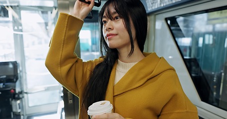 Image showing Bus, morning and Japanese woman with student commute, travel and public transportation in city. Waiting, transport and traveler on a journey on a metro in town with coffee and thinking on a drive