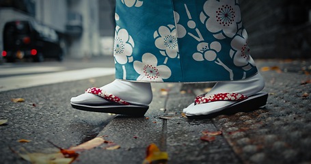 Image showing Feet, Japanese shoes and traditional with walk in city for travel and journey outdoor. Fashion, adventure and urban street in Kyoto, kimono for culture and style with person on local trip for tourism