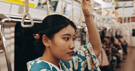 Image showing Japanese woman, travel or train in kimono on public transportation, vacation or metro bullet in urban city. Person, trip or traditional clothes in locomotive, journey or commute in tokyo on adventure