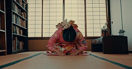 Image showing Woman, prayer and Japanese or spiritual religion in tatami room for tradition culture, respect or ritual. Asian person, kneel and kimono practice or mindfulness healing or god worship, holy or zen