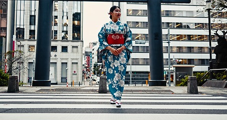 Image showing Woman, Japanese traditional clothes and walking in city, zebra crossing and travel with journey outdoor. Fashion, adventure and urban street in Kyoto, kimono or dress for culture and style with trip