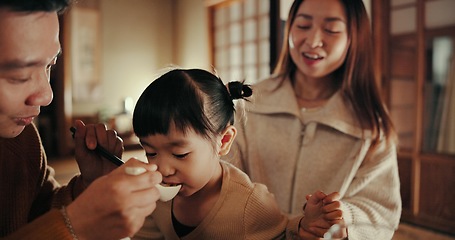 Image showing Family, meal and dinner with girl, parents and Japanese with joy, healthy and home with happiness. Mother, apartment or father with kid, food and bonding together with nutrition, or child development