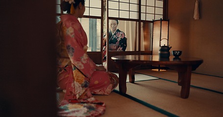 Image showing Japanese, women and kimono in corridor for ceremony in chashitsu room with indigenous fashion or clothing. People, ritual and culture for temae, wellness and zen in architecture building in Tokyo