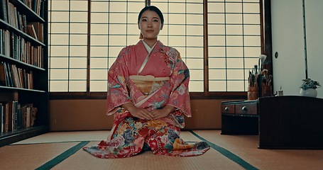 Image showing Japanese woman, face and kimono for ceremony in Chashitsu room and sitting on the floor. Traditional, fashion or girl with pride, respect and honor for culture, heritage and waiting for matcha or tea