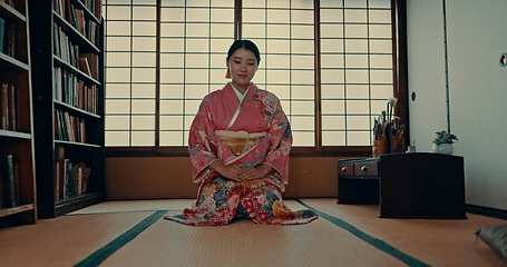 Image showing Woman, Japanese and spiritual wellness in traditional tatami room for zen culture, gratitude or ritual. Asian person, kneel and kimono for mindfulness care healing or bamboo floor, worship or holy