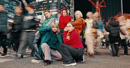 Image showing City, urban and Japanese friends with gen z, youth culture and streetwear style outdoor in Japan with group. Young people, travel and road with teen clothing, women and together in town on trip