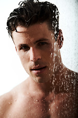 Image showing Portrait of man in shower with muscle, cleaning hair and body for morning wellness, hygiene and routine. Grooming, skincare and relax, male model washing in water with self care and calm bathroom.