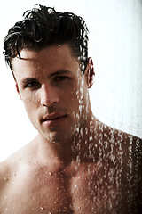 Image showing Portrait of man in shower, cleaning body and grooming for morning wellness, hygiene and skin routine. Relax, skincare and face of male model with muscle washing in water, self care and calm bathroom.