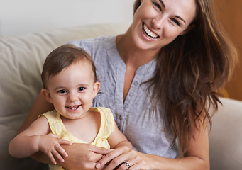 Image showing Mother, baby and smile in portrait at home, love and together for bonding in childhood. Mommy, daughter and support for happy toddler in child development, mama and security or connection on sofa