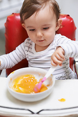 Image showing Baby, high chair and bowl for meal, nutrition or healthy porridge with spoon to eat food at home. Young adorable cute little child, kid or toddler playing with snack for hunger, vitamins or nutrients