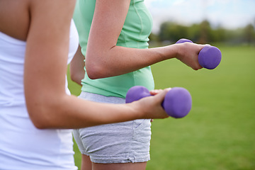 Image showing Dumbbell in hands, weightlifting for exercise and muscle, athlete outdoor for sport and bodybuilding. Healthy, fitness equipment and strong people in park, bicep and bodybuilder with workout together