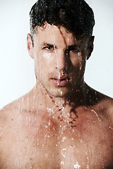 Image showing Portrait of man in shower to relax, cleaning hair and body for morning wellness, hygiene or routine. Grooming, skincare and serious face of male model washing in water, self care and calm in bathroom