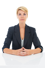Image showing Job interview, studio or portrait of a businesswoman at desk for recruitment, hiring or start in corporate. Serious face, assertive or professional lady with confidence isolated on a white background