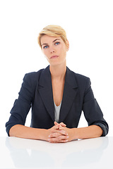 Image showing Job interview, white background or portrait of a businesswoman at desk for recruitment or hiring. Table, corporate, serious worker or professional lady with confidence or company isolated in studio