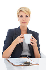 Image showing Coffee, checklist or portrait of a businesswoman at a desk for recruitment, hiring or interview in studio. Drinking tea, serious lady or hr manager with paperwork or clipboard on a white background