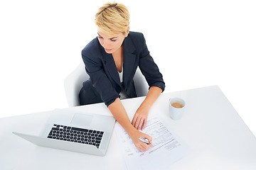 Image showing Business woman, laptop and documents in studio for accounting, taxes management and budget report. Professional accountant writing at her desk with computer and paperwork on a white background above