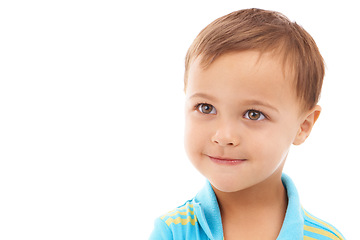 Image showing Smile, cute and young child in a studio with sweet, positive and good attitude for development. Happy, childhood and face of natural boy kid toddler with casual style isolated by white background.