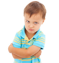 Image showing Boy, arms crossed and anger in studio portrait with mental health, anxiety and stress by white background. Child, sad and person with depression, frustrated and fear with grief, moody and upset