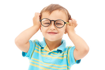 Image showing Child, boy and glasses in studio portrait, eyes and vision support by white background. Happy male person, kid and ophthalmology for eyecare or sight, spectacles and stylish fashion or cool frame