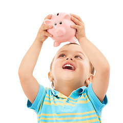 Image showing Boy child, piggy bank and happy in studio with thinking, money and savings by white background. Kid, box or animal toy for coins, cash and learning to invest for wealth, future or financial security