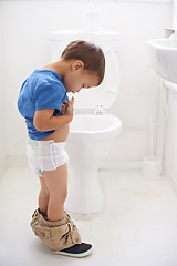 Image showing Boy child, potty training and bathroom with thinking, diaper and pants on floor for learning, development and progress. Kid, family home and check in toilet with ideas, hygiene or solution with nappy