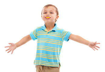 Image showing Child, smile and portrait with orange in mouth in white background, studio and mockup space. Fruit, slice and kid with healthy food, nutrition and citrus in diet for wellness and vitamin c benefits