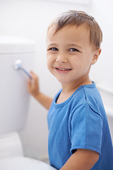 Image showing Boy child, flush toilet and potty training for smile, portrait or pride for development in family home. Kid, bathroom and hygiene with wellness, cleaning or water for waste, dirt or bacteria in house