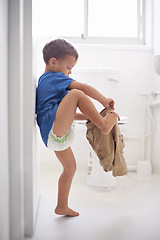 Image showing Child, bathroom and toilet training for learning growth, milestone or hygiene. Male person, kid diaper and pants or step for development in home for parent care for toddler teaching, health or love