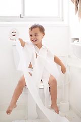 Image showing Boy child, potty training and toilet paper with sitting, mummy and thinking for learning, development or comic game. Child, family home and laugh in bathroom with tissue, hygiene or funny with joke