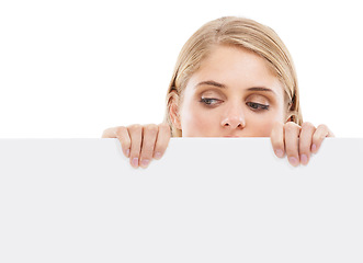 Image showing Thinking, face and woman with empty poster, sign or banner for question in white background and mockup. Studio, space and person with blank signage for information on choice, decision or cardboard