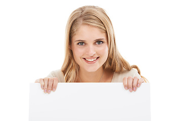 Image showing Happy, portrait and woman with blank poster, sign or banner in white background and mock up. Studio, space and person with empty signage for announcement information, news on cardboard and paper