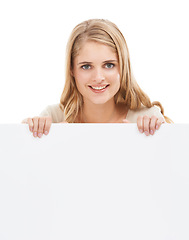 Image showing Happy, woman and portrait with blank poster, sign or banner in white background and mock up. Studio, space and person with an empty signage for announcement information, news on cardboard and paper