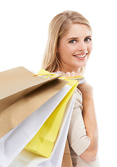 Image showing Portrait, woman and shopping bag in studio for happy retail sales, financial freedom and commerce savings on white background. Rich customer buying gifts for deal, mall discount and promotional offer