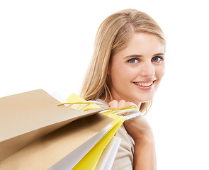 Image showing Portrait, happy woman and shopping bag in studio for retail sales, financial freedom and commerce savings on white background. Rich customer buying gifts for deal, discount offer and mockup promotion