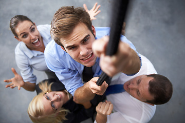 Image showing Corporate people, man and climbing rope for career goals, target or team building exercise with support, motivation and drive. Top view, struggle or portrait of person with hard work on group mission