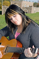 Image showing Girl With Her Guitar