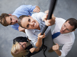 Image showing Business, people or woman climbing rope for career ambition, job progress or team building collaboration. Motivation, top view and worker with determination, support and drive for service commitment