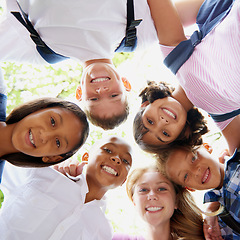 Image showing Children, happiness and huddle in portrait outdoor, trees and sunshine with solidarity in city. Students, teenager or together in diversity on school playground, summer or education in below in town