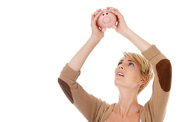 Image showing Frustrated woman, piggy bank and financial crisis for debt, loss or mistake on a white studio background. Young female person looking in money container for coins, cash or finance on mockup space
