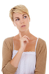 Image showing Woman, face and thinking for choice, decision or option isolated on a white studio background. Young female person, model or blonde in wonder or thought for idea, pick or selection on mockup space