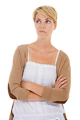 Image showing Woman, thinking and arms crossed in doubt, decision or choice on a white studio background. Female person, model or blonde looking in distance, wonder or thought for ideas in confidence on mockup