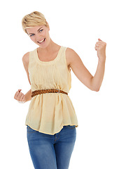 Image showing Happy woman, fist pump and celebration in winning, promotion or good news on a white studio background. Young female person, model or blonde smile for achievement, success or deal on mockup space