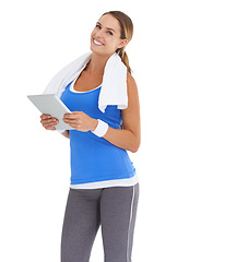 Image showing Woman, training and tablet in studio for workout, fitness or wellness results, data and information on a white background. Portrait of a happy, sports model with digital technology for exercise blog