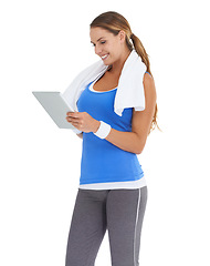 Image showing Woman, fitness and tablet in studio for social media, data or results of workout, exercise or training progress. Sports model typing on digital technology for website or blog on a white background