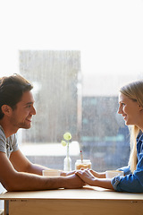 Image showing Space, cafe or happy couple holding hands on date talking or speaking of anniversary or holiday vacation. Tea drink, woman or romantic man in conversation for care, love or support in coffee shop