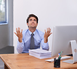 Image showing Businessman, documents and frustrated at desk in office with burnout, mental health and deadline. Entrepreneur, person and stress with paperwork at workplace for overwork, anxiety and career fail