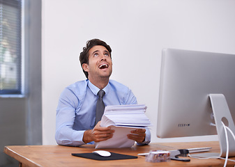 Image showing Businessman, paperwork and frustrated at desk in office with burnout, mental health and deadline. Entrepreneur, person and stress with documents at workplace for overwork, anxiety and career fail