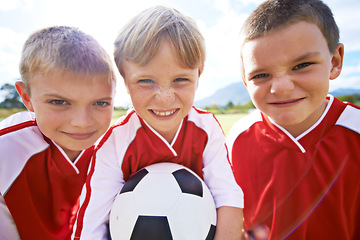 Image showing Children, group portrait and soccer team or unity, happy and collaboration or support. People, kids and ready for match and partnership or teamwork, smiling and solidarity or energy for game on field